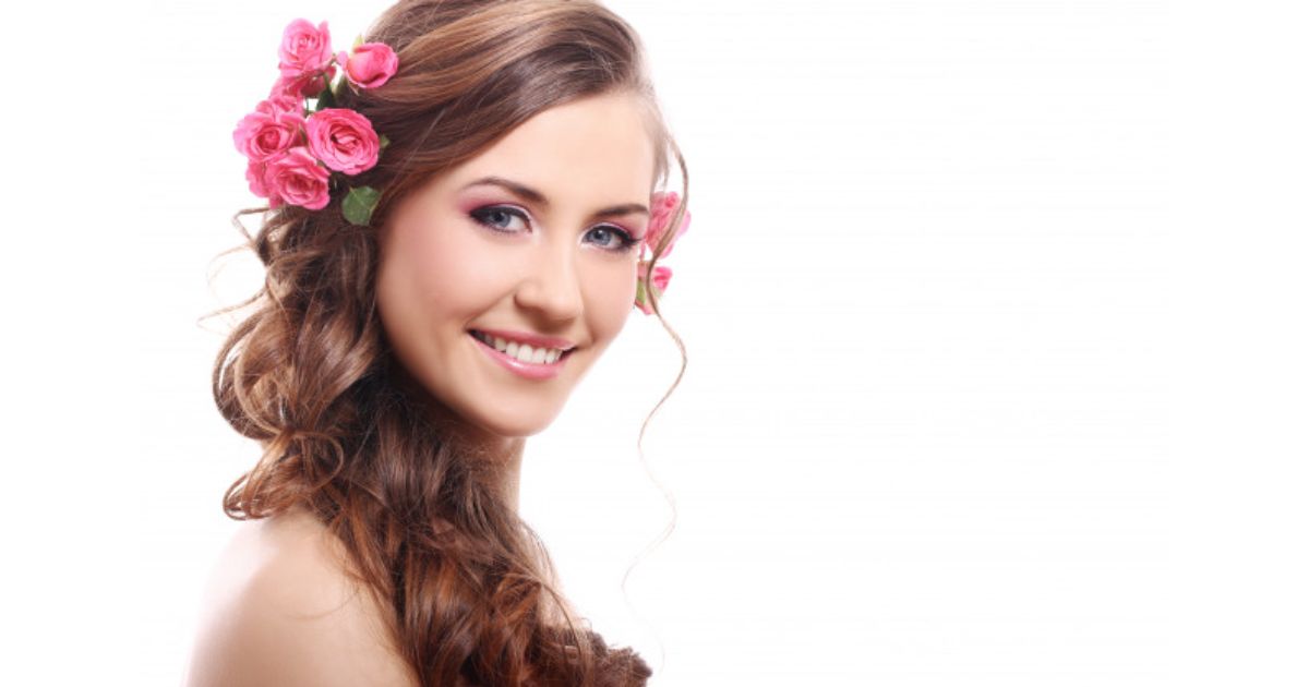beautiful-woman-with-roses-hair_144627-16472