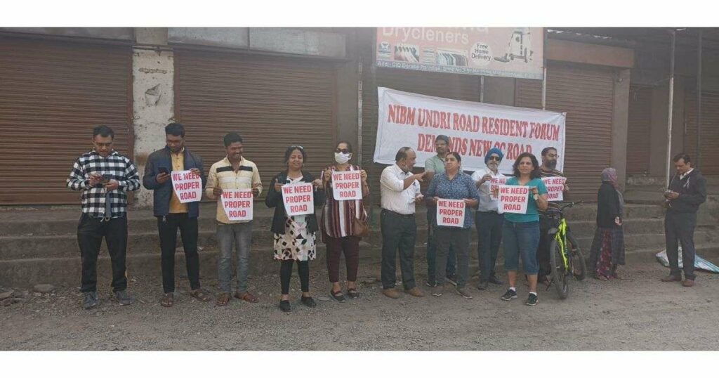 Residents-protest-push-PMC-to-concretise-Marvel-Sangria-Dorabjee-Paradise-road-updraft-pre-smush-original