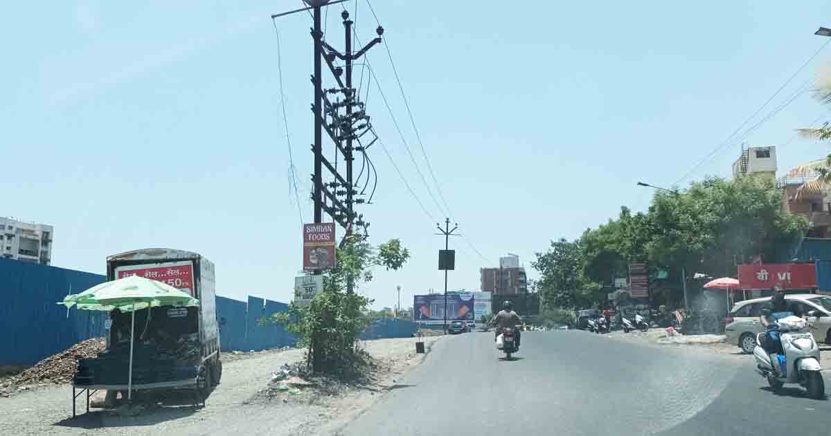 Electricity pole poses danger to motorists at Kad Nagar chowk in Undri 1