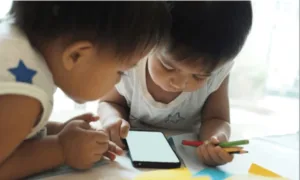 Young Child Speaks Japanese and Chinese from Mobile Reel Watching, Raises Concerns