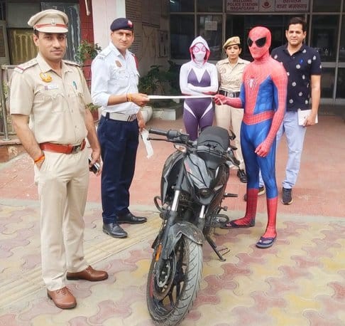 Watch Video: Police Arrest 'Spider Man' and 'Spider Woman' for Reckless Motorcycle Stunts