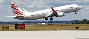 Naked man arrested after causing chaos on Australian flight