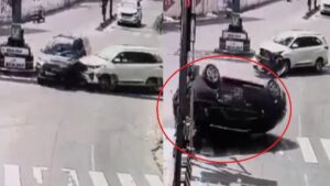 Captured on Camera: Speeding SUV Jumps Red Light, Crashes, and Flips Multiple Times on Busy Road
