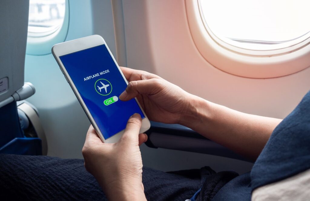 What Really Happens If You Don’t Switch to Airplane Mode During a Flight?