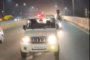 Man Performs Stunt Aboard UP Government Vehicle on Ghaziabad Highway; Two Held After Viral Video
