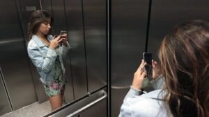 Why Do Elevators Have Mirrors? It's Not Just for Checking Your Reflection