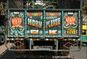 Behind the Phrase: The Significance of 'Horn OK Please' on Indian Trucks.