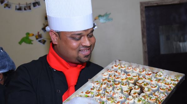 Pune Chef Sarvesh Jadhav Bakes Over 4,600 Mini Pizzas, Sets Record with a Heartwarming Twist