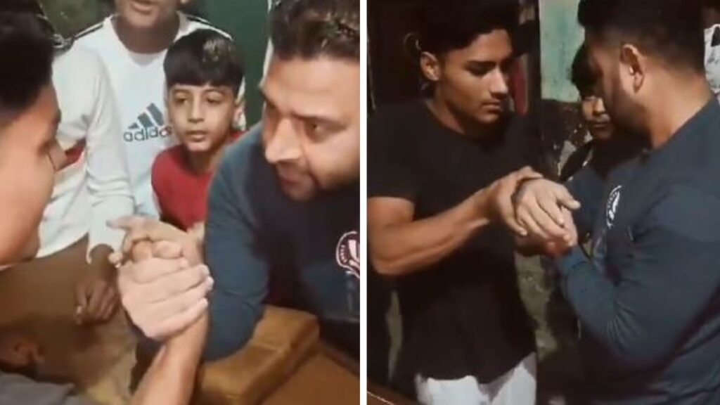 Shocking Footage Man's hand breaks during arm wrestling match in Moradabad, UP