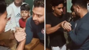 Shocking Footage Man's hand breaks during arm wrestling match in Moradabad, UP