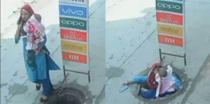 woman with baby fell into manhole