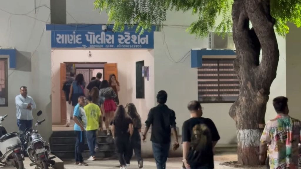 Liquor Party Raid: Woman Tries to Flee Police Station After Sanand Resort Bust, Caught on Camera