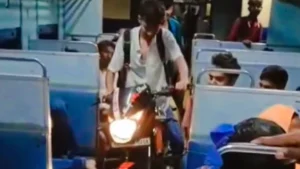 Man Seen Riding Motorcycle Inside Train Coach; Passengers Left Stunned