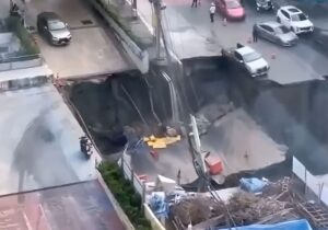 Massive 50-Metre Sinkhole Opens in Bangkok, Swallows Car and Power Poles – Shocking Video Goes Viral