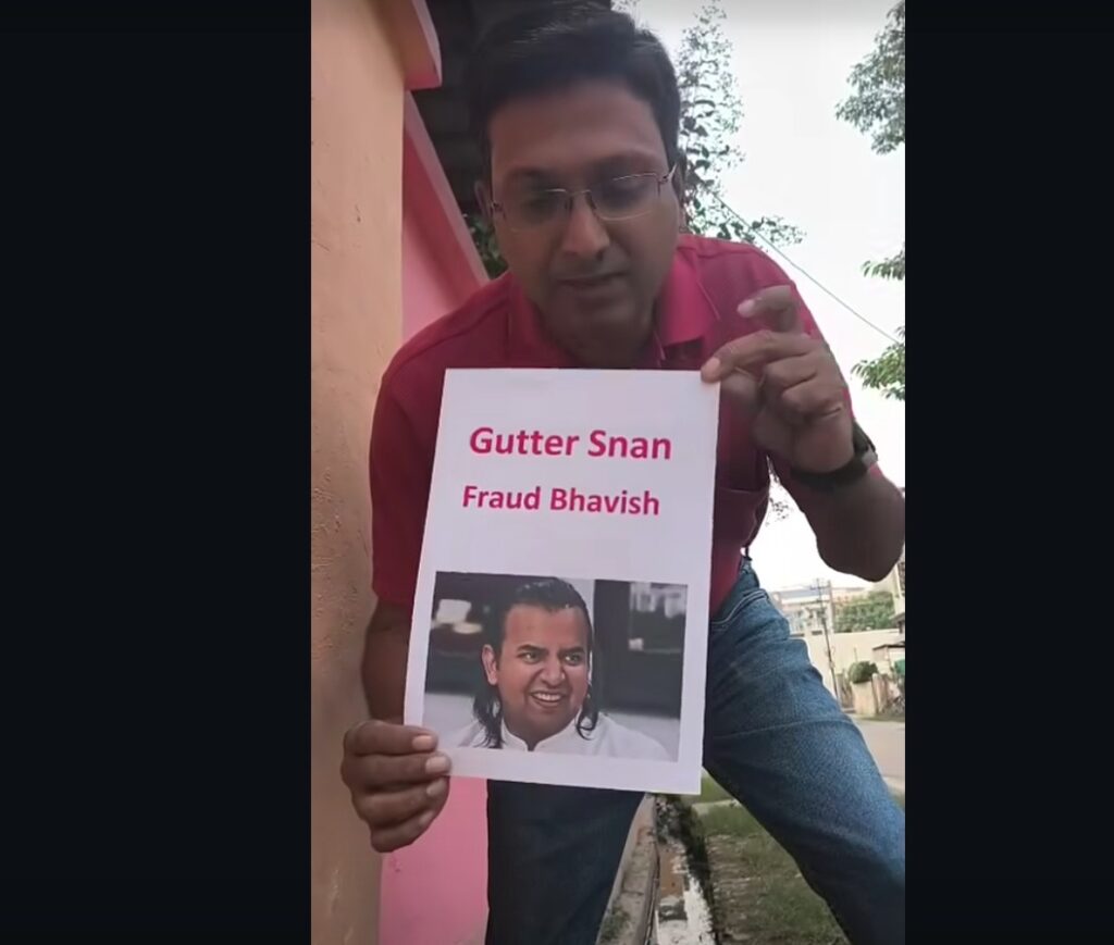 Viral Video: Bhavish Aggarwal Booked in Employee Suicide Case; Man Performs ‘Digital Gutter Snan’ For Ola Electric CEO 