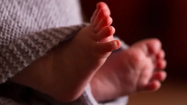 Tragic Loss in Amroha 23-Day-Old Baby Dies After Being Crushed Between Parents While Sleeping