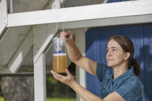 The Viral Balcony Bottle Trick: How Hanging Water and Vinegar Mixtures Keep Pests Away