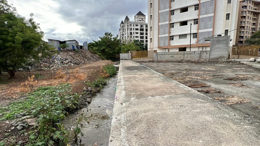 Pune News: Public Health At Risk? Residents Sound Alarm Over Unchecked Sewage Discharge Behind Ganga Kingston In NIBM Annexe